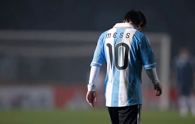 Argentina's Messi walks off the field after the end of their match against Colombia in the first round of the Copa America soccer tournament in Santa Fe