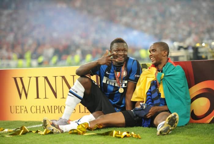 Inter Milan's Cameroonian forward Samuel Eto'o (R) and Inter Milan's Ghanaian midfielder Sulley Ali Muntari celebrate after winning the UEFA Champions League final football match Inter Milan against Bayern Munich at the Santiago Bernabeu stadium in Madrid on May 22, 2010. Inter Milan won the Champions League with a 2-0 victory over Bayern Munich in the final at the Santiago Bernabeu. Argentine striker Diego Milito scored both goals for Jose Mourinho's team who completed a treble of trophies this season. AFP PHOTO / CHRISTOPHE SIMON (Photo credit should read CHRISTOPHE SIMON/AFP/Getty Images)