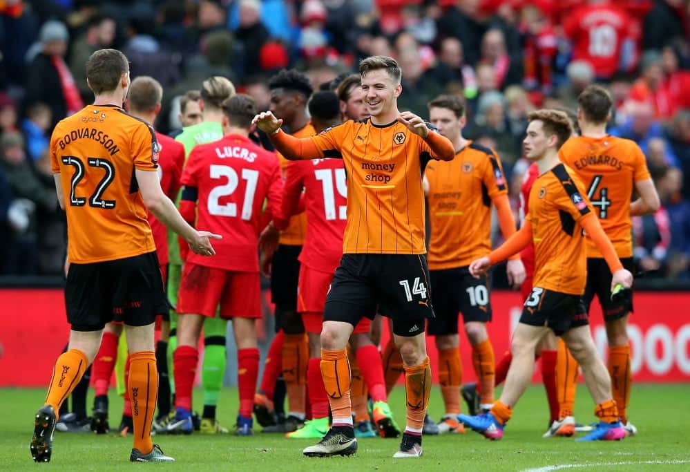 LIVERPOOL, ENGLAND - JANUARY 28: Wolves players celebrate victory during the Emirates FA Cup Fourth Round match between Liverpool and Wolverhampton Wanderers at Anfield on January 28, 2017 in Liverpool, England. (Photo by Alex Livesey/Getty Images)