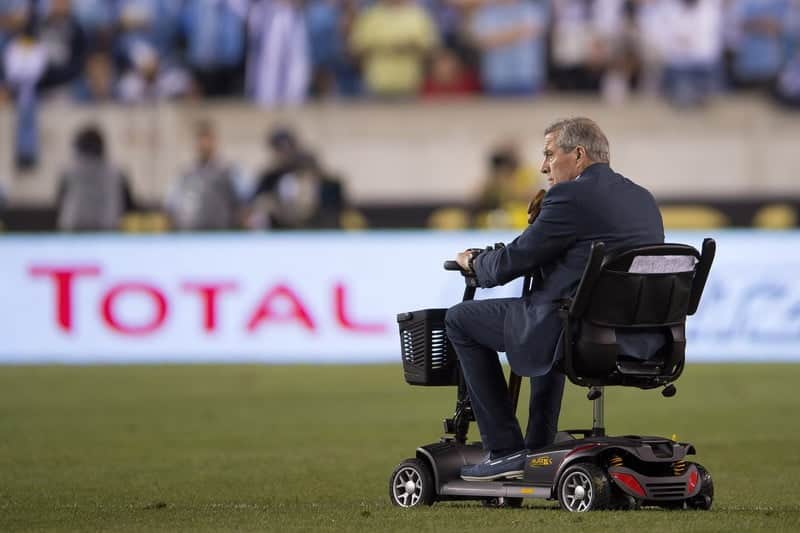 Uruguay coach Oscar Tabarez on a mobility scooter. -------------------- ISI (USA) / BPI Football - Copa America 2016 Group Stage Group C Uruguay v Venezuela Lincoln Financial Field, Philadelphia, United States 09 June 2016 ??2016 ISI (USA) / BPI all rights reserved