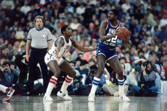 INDIANAPOLIS - FEBRUARY 10: Magic Johnson #32 of the Western Conference All-Stars looks to pass against the Isiah Thomas #11 of the Eastern Conference All-Stars during the 1985 NBA All-Star game at Market Square Arena on February 10, 1985 in Indianapolis, Indiana. NOTE TO USER: User expressly acknowledges and agrees that, by downloading and/or using this Photograph, user is consenting to the terms and conditions of the Getty Images License Agreement. Mandatory Copyright Notice: Copyright 1985 NBAE (Photo by Andrew D. Bernstein/NBAE via Getty Images) *** Local Caption *** Ervin 'Magic' Johnson;Isiah Thomas